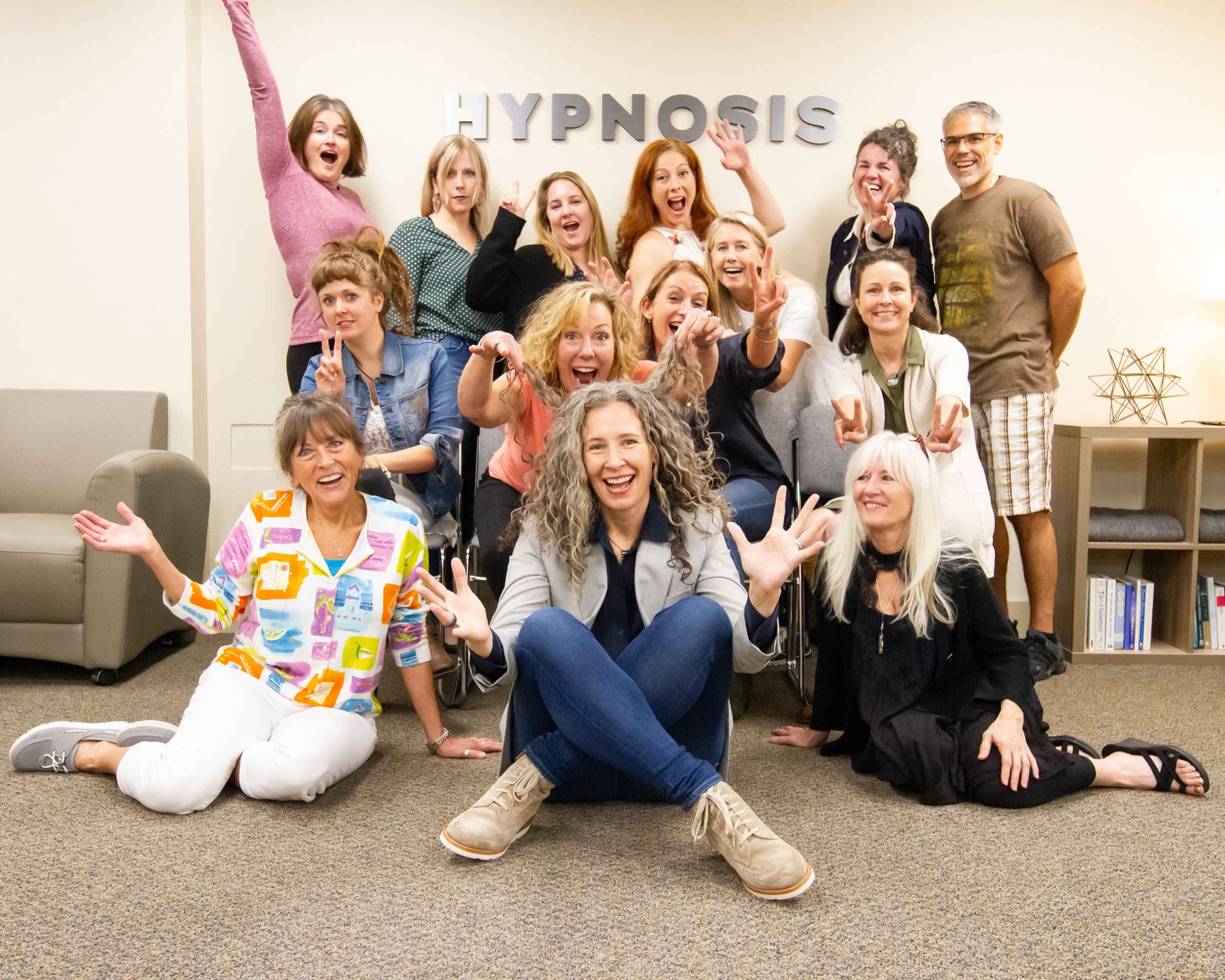 getting-operational-featured Hypnosis training students celebrating in class with Erika Flint